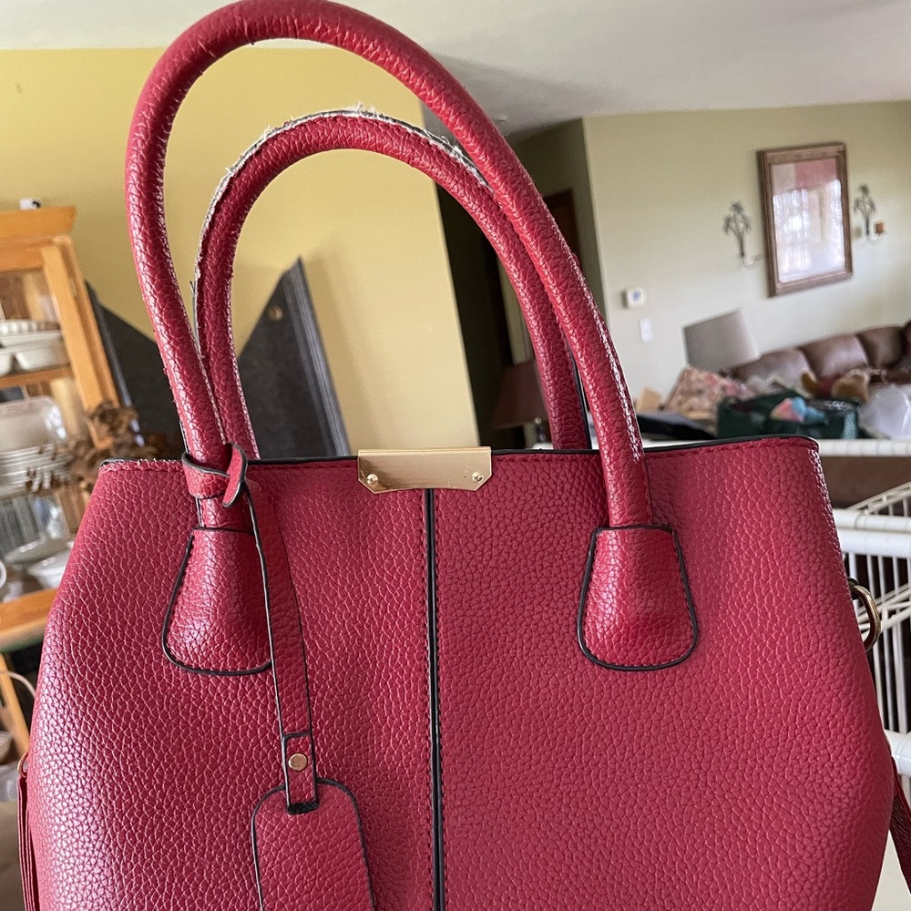 Red vinyl purse.